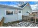 Cozy back deck with access to hot tub at 207 E Ohio St, Fortville, IN 46040