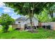 Private backyard featuring a spacious deck and enclosed hot tub for relaxation and entertainment at 207 E Ohio St, Fortville, IN 46040