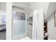 Clean bathroom with a walk in shower and modern finishes at 207 E Ohio St, Fortville, IN 46040