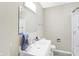 Clean bathroom with a single sink vanity and shower at 207 E Ohio St, Fortville, IN 46040