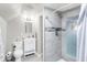 Updated bathroom with a shower, toilet, and vanity at 207 E Ohio St, Fortville, IN 46040