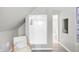 Small bathroom with a shower and modern fixtures at 207 E Ohio St, Fortville, IN 46040