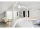 Charming bedroom with a four poster bed, ensuite bathroom, and calming decor at 207 E Ohio St, Fortville, IN 46040