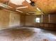 Spacious and open garage interior with concrete floor, ready for customization at 208 Winding Dr, Alexandria, IN 46001