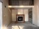 Spacious living room featuring a fireplace and built-in shelving at 208 Winding Dr, Alexandria, IN 46001