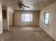 Large living room with bay window and wall-to-wall carpet at 208 Winding Dr, Alexandria, IN 46001