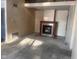 Living room with a fireplace and loft area above at 208 Winding Dr, Alexandria, IN 46001
