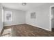 Spacious bedroom featuring hardwood floors and large window at 2109 California St, Columbus, IN 47201