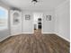 Dining room with hardwood floors and kitchen view at 2109 California St, Columbus, IN 47201