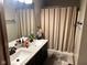 Bathroom with double vanity, shower, and tub at 245 Myerwood Dr, Danville, IN 46122