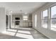 Modern kitchen with stainless steel appliances and light green cabinets at 2997 W Longbranch Dr, Monrovia, IN 46157