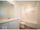 A bathroom featuring modern fixtures, including a vanity with quartz countertops at 3231 W Keepsake Ln, Monrovia, IN 46157
