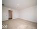 Carpeted bedroom with white walls and natural light, adjoining closet and bathroom at 3231 W Keepsake Ln, Monrovia, IN 46157