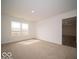 Bright, carpeted bedroom with natural light, adjoining closet, and neutral walls at 3231 W Keepsake Ln, Monrovia, IN 46157