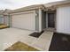 The front facade of a one story home with a two car garage and a grassy front yard at 3231 W Keepsake Ln, Monrovia, IN 46157