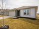 A single-story home with a well-maintained lawn and inviting curb appeal at 3231 W Keepsake Ln, Monrovia, IN 46157
