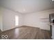 Open living area with walk-out access to backyard and bright natural light at 3231 W Keepsake Ln, Monrovia, IN 46157
