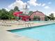 Community pool with a water slide, a barn, a water tower, and plenty of lounge chairs at 3231 W Keepsake Ln, Monrovia, IN 46157