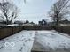 Large backyard with snow-covered ground at 334 Hamilton Ave, Indianapolis, IN 46201