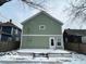 Private backyard with snow covered patio at 334 Hamilton Ave, Indianapolis, IN 46201