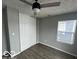 Bedroom with double door closet and vinyl plank flooring at 334 Hamilton Ave, Indianapolis, IN 46201