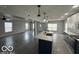 Open concept kitchen with island and stainless steel appliances at 334 Hamilton Ave, Indianapolis, IN 46201