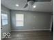 Living room with vinyl plank flooring and exterior access at 334 Hamilton Ave, Indianapolis, IN 46201