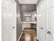 Ensuite bathroom with vanity area featuring mirrors and a chair at 3543 Clearwater Cir, Indianapolis, IN 46240