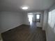 Spacious living area with hardwood floors and an open floor plan at 3608 N Kenwood Ave, Indianapolis, IN 46208