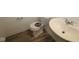 Clean bathroom featuring a sleek vanity, toilet, and a shower-tub combination at 3945 Highcrest Rd, Indianapolis, IN 46239