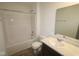 Bright bathroom with a shower-tub combination and a vanity with ample counter space at 3945 Highcrest Rd, Indianapolis, IN 46239