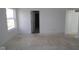 Bright bedroom with an open door to another room at 3945 Highcrest Rd, Indianapolis, IN 46239