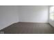Spacious bedroom with neutral carpet and a large window offering ample natural light at 3945 Highcrest Rd, Indianapolis, IN 46239