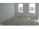 Spacious bedroom with large windows and a view at 3945 Highcrest Rd, Indianapolis, IN 46239