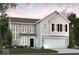 Two-story home with light gray siding, two-car garage, and landscaping at 3945 Highcrest Rd, Indianapolis, IN 46239