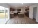 Bright kitchen featuring stainless steel appliances, a central island, and a pantry at 3945 Highcrest Rd, Indianapolis, IN 46239