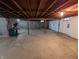 Unfinished basement with high ceilings and utilities at 407 Hawthorne Ln, Greenfield, IN 46140