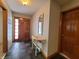 Inviting entryway with slate tile floor and decorative console table at 407 Hawthorne Ln, Greenfield, IN 46140