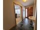 Inviting entryway with slate tile floor and view to living room at 407 Hawthorne Ln, Greenfield, IN 46140