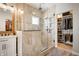 Large walk-in shower with multiple shower heads and bench seat at 4423 Valley Trace Dr, Indianapolis, IN 46237