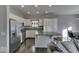 Modern kitchen with stainless steel appliances and white cabinets at 4623 Creighton Ln, Indianapolis, IN 46237