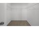 Walk-in closet with carpet flooring and wire shelving installed around the perimeter at 5144 Rolling Meadow Blvd, Indianapolis, IN 46237