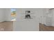 Modern kitchen with white cabinetry, stainless steel appliances, and a center island at 5144 Rolling Meadow Blvd, Indianapolis, IN 46237
