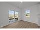 Bright open space with sliding glass doors to the backyard at 5144 Rolling Meadow Blvd, Indianapolis, IN 46237