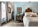 Bedroom with light walls and antique wooden furniture at 634 E Vermont St, Indianapolis, IN 46202