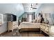 Spacious bedroom with light walls, wood floors and large bed at 634 E Vermont St, Indianapolis, IN 46202