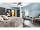 Bright bedroom with hardwood floors, window seat, and ensuite bathroom at 634 E Vermont St, Indianapolis, IN 46202