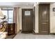 Interior entryway with dark brown door and tile floor at 634 E Vermont St, Indianapolis, IN 46202