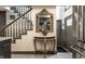 Elegant entryway with ornate mirror and marble-top console table at 634 E Vermont St, Indianapolis, IN 46202