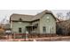 Charming two-story home boasts a classic design, complete with a well-maintained yard and inviting facade at 634 E Vermont St, Indianapolis, IN 46202